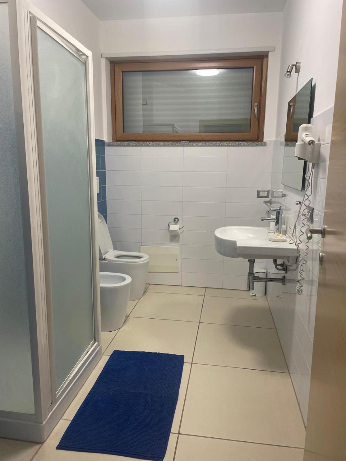 Casa Vacanza Acquamarina Porto Torres Esterno foto