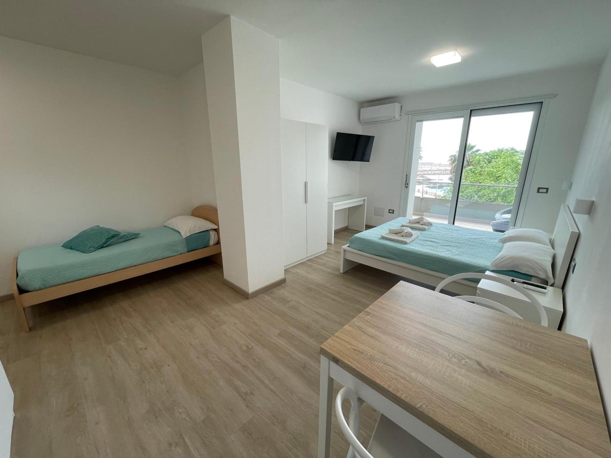 Casa Vacanza Acquamarina Porto Torres Esterno foto