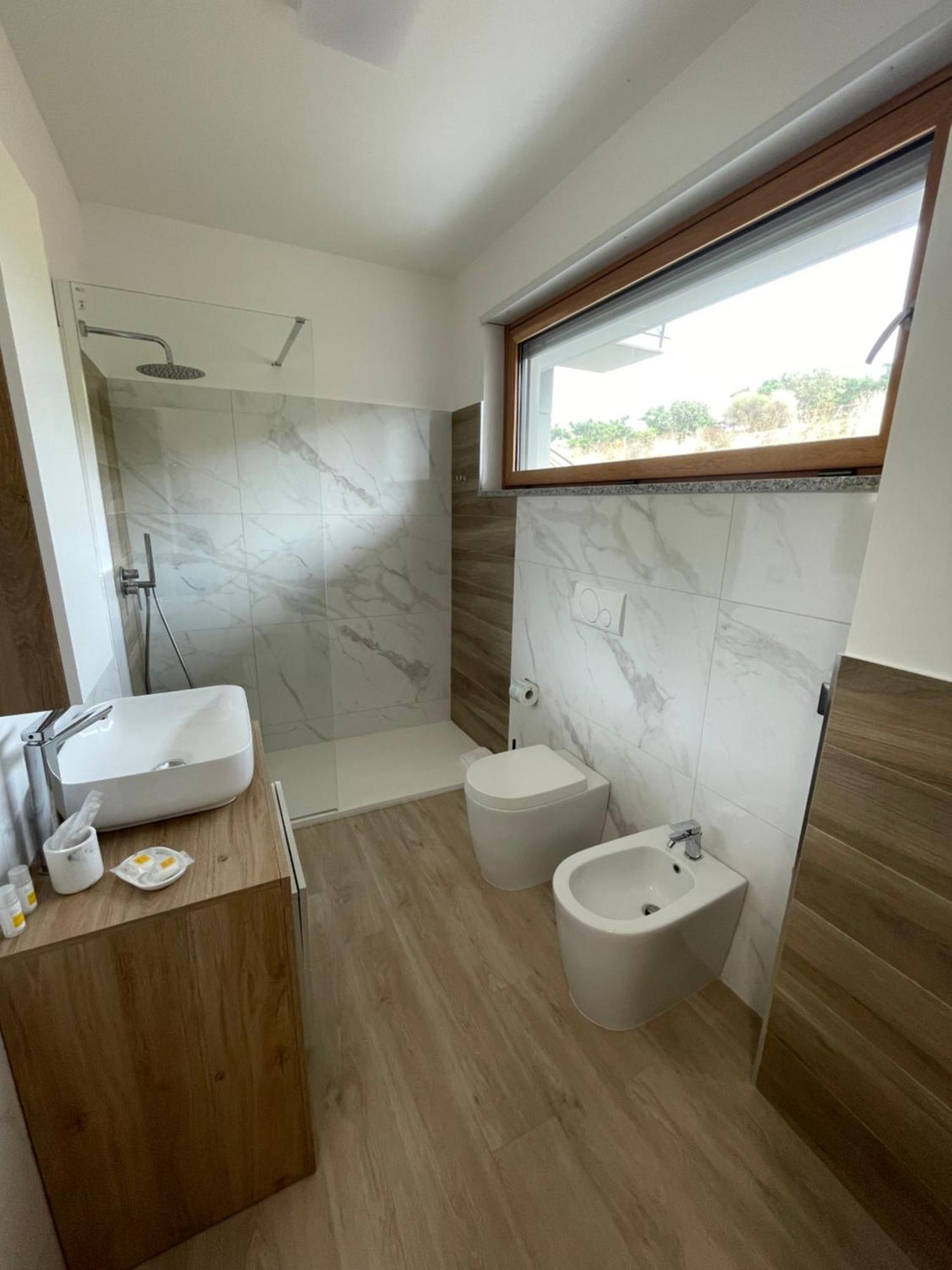 Casa Vacanza Acquamarina Porto Torres Esterno foto